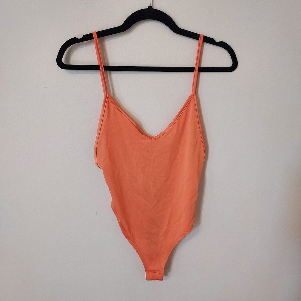 Boohoo, orange backless bodysuit,  size 4